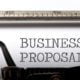 The term business proposal printed on an old typewriter