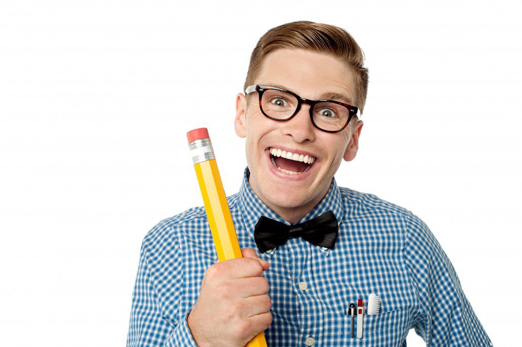 Laughing nerd with pencil to highlight using humour in speech writing.